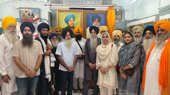 Sikh leaders during the installation of portraits of Sikh personalities.